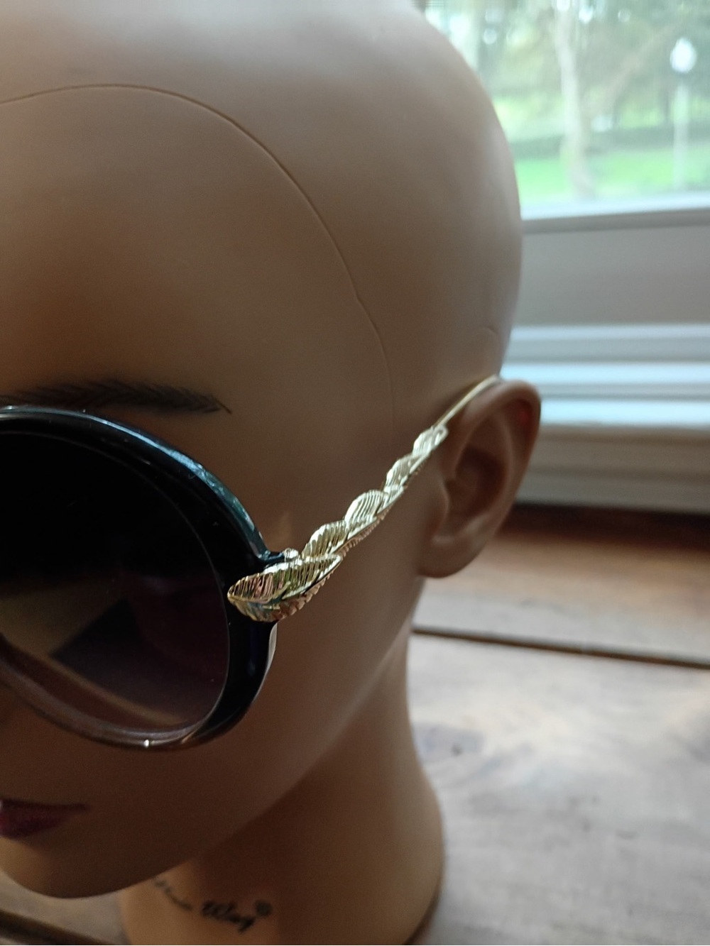Gold-Accent Black Round Women’s Sunglasses